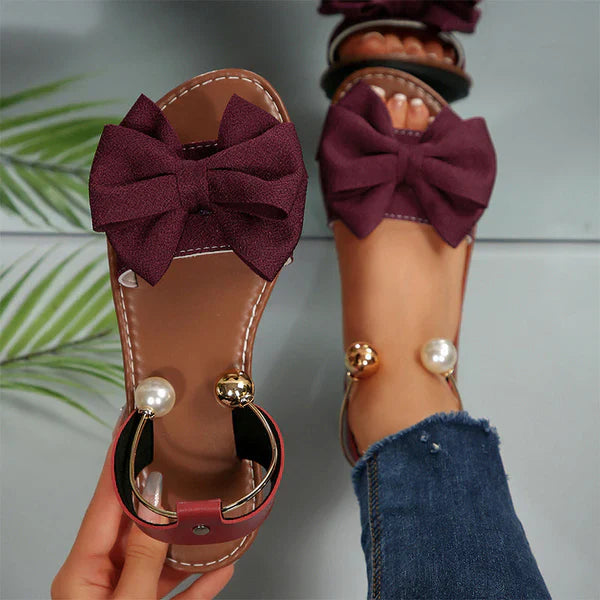 Liora - Sandalias de tiras elegantes con detalle de perla