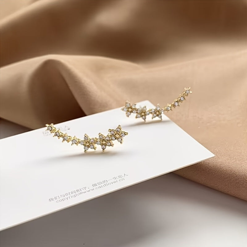 DELACROIX | BOUCLES D’OREILLES FLORALES INTEMPORELLES
