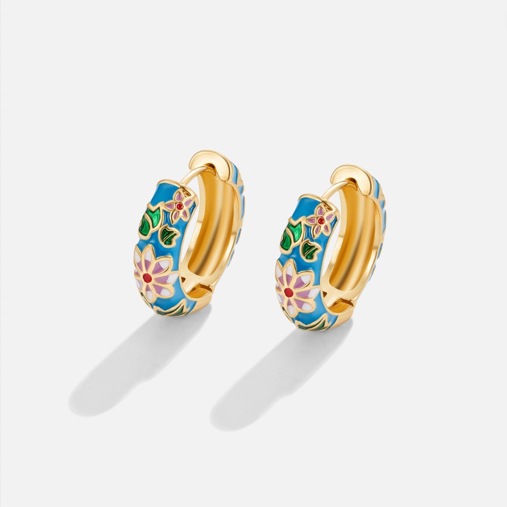 DELACROIX | BOUCLES D’OREILLES EN CERCLE DORÉ AVEC FLEUR